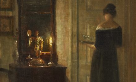 “Interior con una mujer a la luz de las velas” (1900), de Carl Holsøe