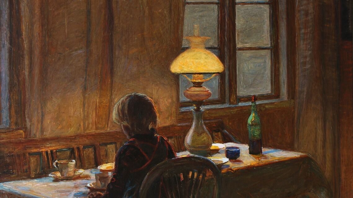 “El hijo del artista Lars Jacob (Zakker) sentado en la mesa del comedor” (1907), de Fritz Syberg